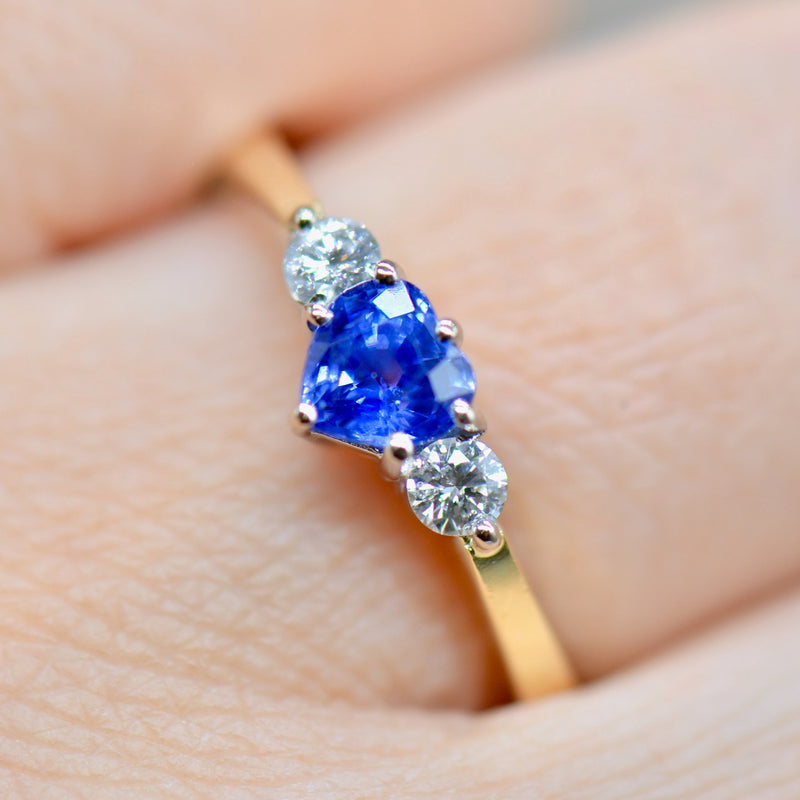 1980s Cornflower Blue Heart Shaped Sapphire & Diamond 18ct Yellow Gold Trilogy Ring (0.83ct)