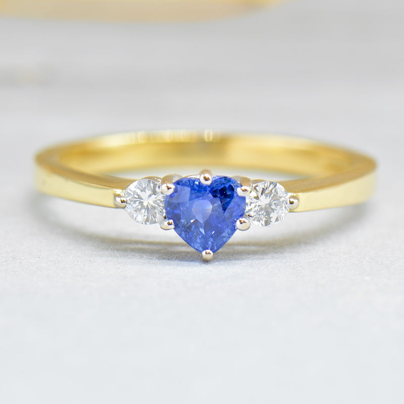 1980s Cornflower Blue Heart Shaped Sapphire & Diamond 18ct Yellow Gold Trilogy Ring (0.83ct)