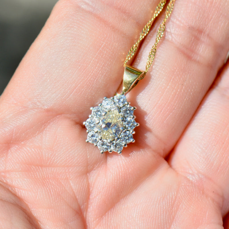 Yellow and White Diamond 18ct Yellow Gold Pear-Shaped Halo Pendant With Complementary Chain (1.11cts)