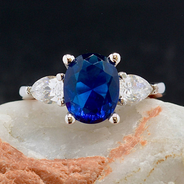 Trilogy Three-Stone Blue and Colourless CZ Sterling Silver Engagement Ring