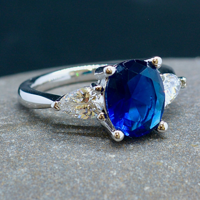 Trilogy Three-Stone Blue and Colourless CZ Sterling Silver Engagement Ring