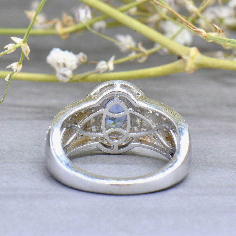 Tanzanite and White Zircons Silver Halo Three-Layer Design Ring