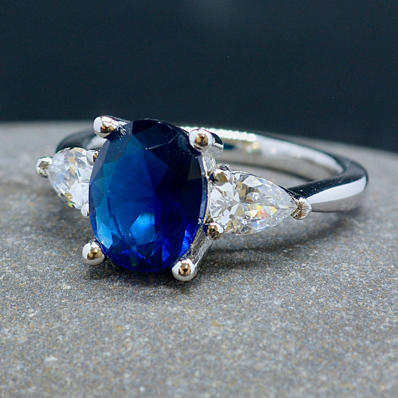 Trilogy Three-Stone Blue and Colourless CZ Sterling Silver Engagement Ring