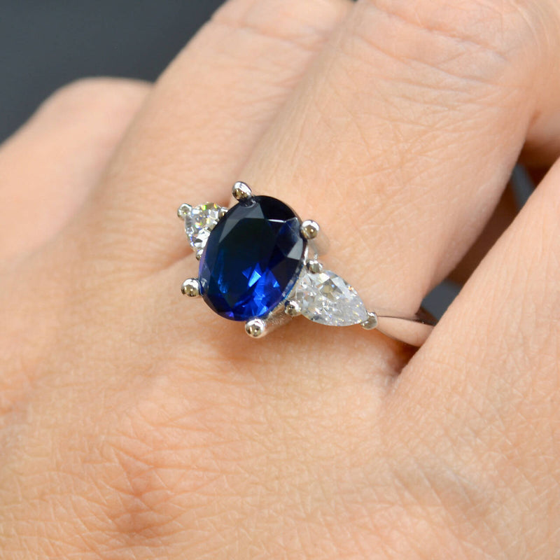 Trilogy Three-Stone Blue and Colourless CZ Sterling Silver Engagement Ring