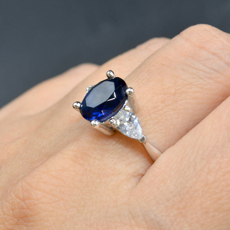 Trilogy Three-Stone Blue and Colourless CZ Sterling Silver Engagement Ring